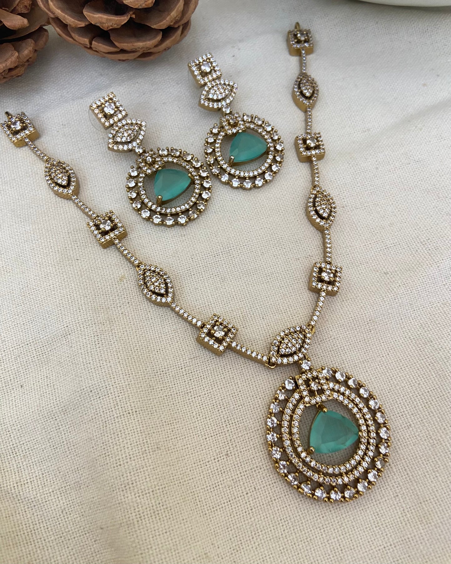 Polki necklace set with sea green stones