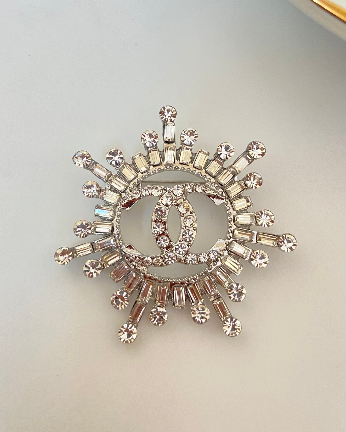 CC studded Brooch