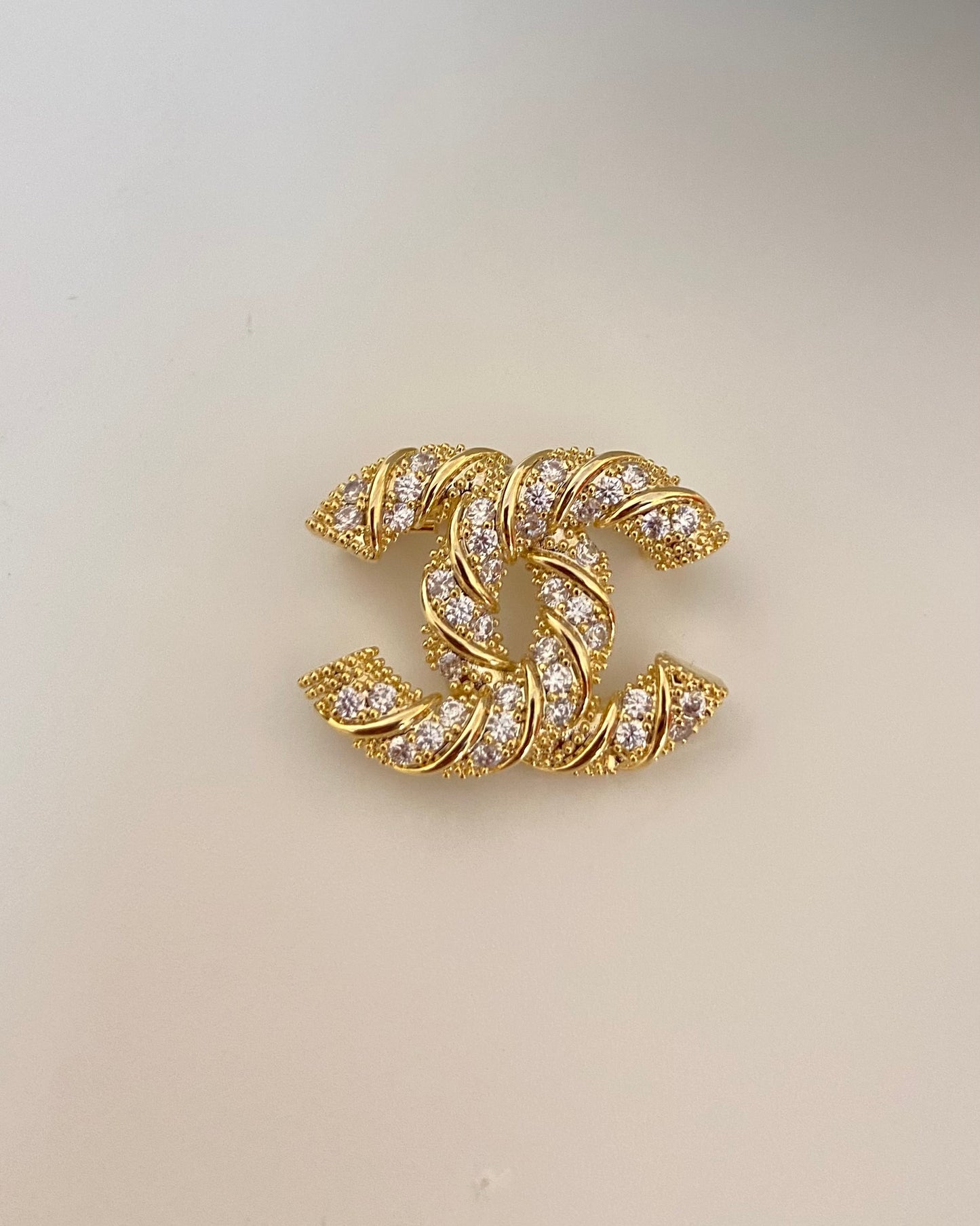 Cc gold Brooch