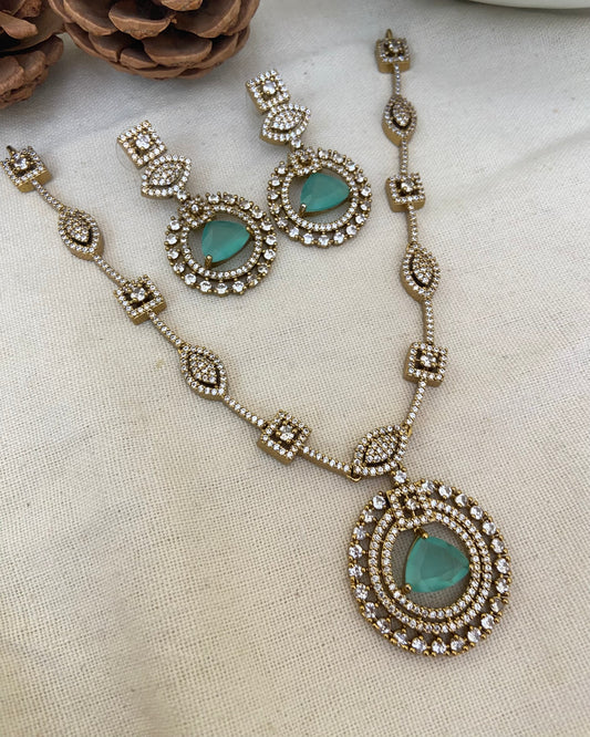 Polki necklace set with sea green stones