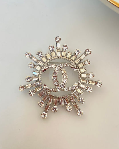 CC studded Brooch