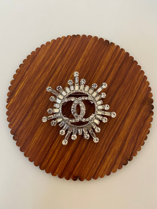 CC studded Brooch